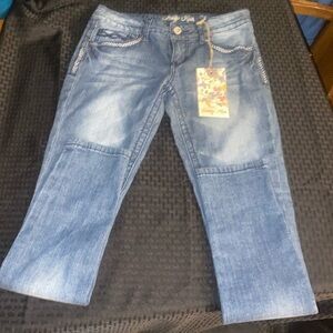 These are brand new jeans, worn once just to try on.